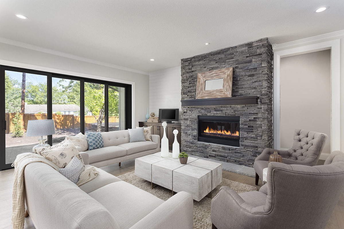 furnished living room in newly constructed luxury home